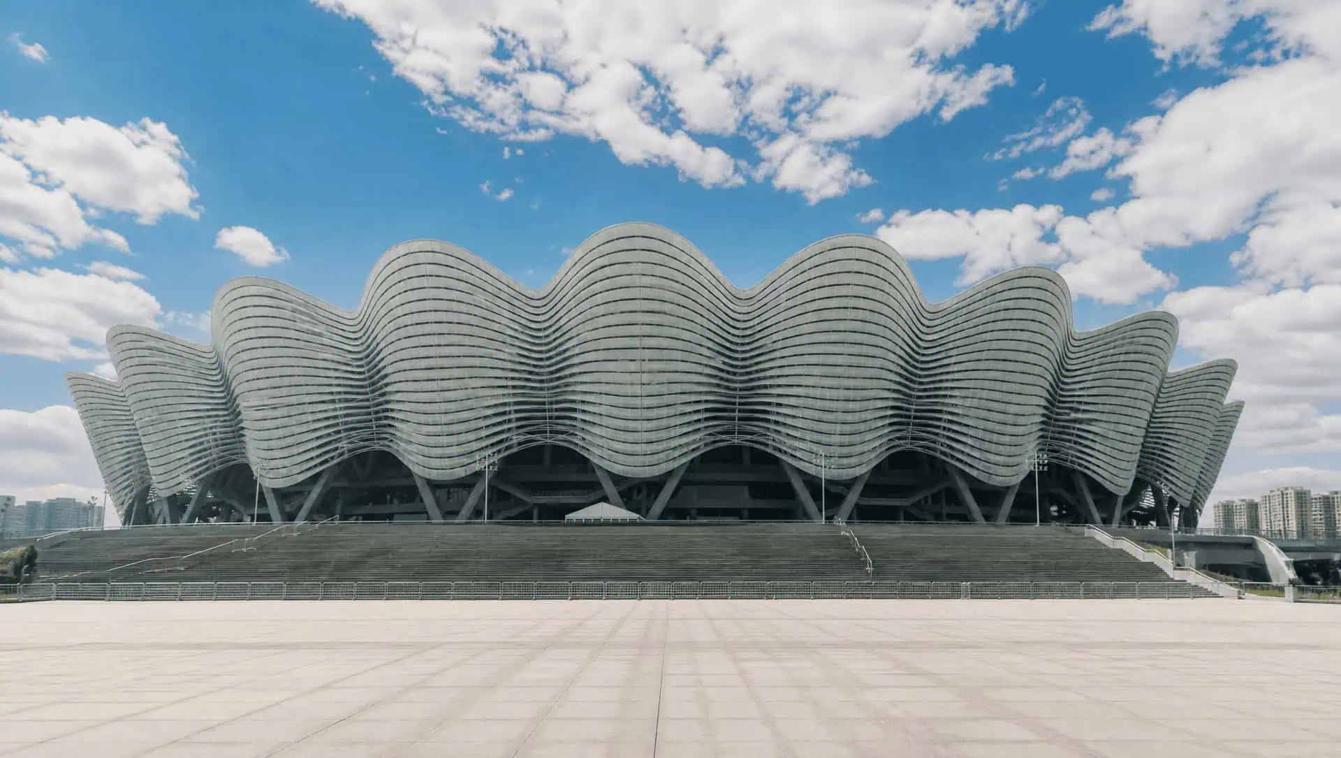 The sweeping ribbed roof of Xi'an Olympic Sports Center stadium