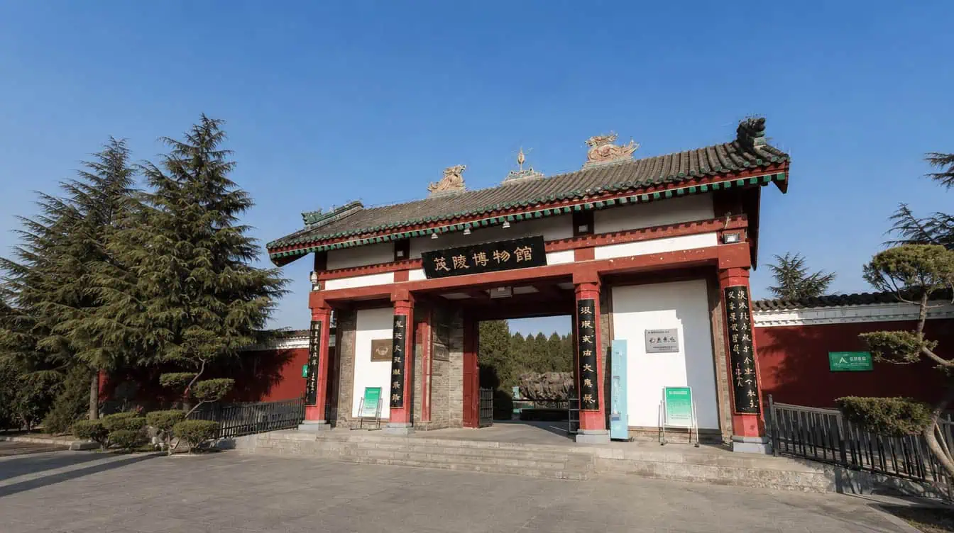 The grassy tomb mound and Han-dynasty stone carvings at Maoling